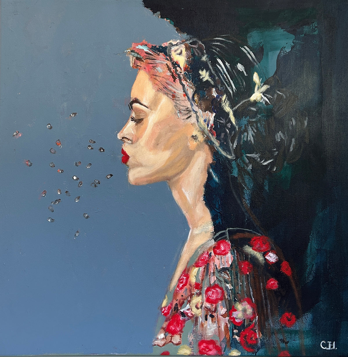 contemporary figurative artist | Cristina Henley| An oil painting in profile view showing a woman with her hair adorned with flowers, blowing small seeds from her lips. She wears a dress with a vibrant red floral pattern. The background is split between a soft, muted blue on the left and a deep, dark shadow on the right. Through figurative storytelling and symbolic imagery, storytelling artwork that  Exploring Female Identity, Friendship, Love, and Resilience.